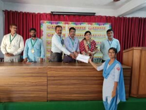 Student receiving BFSI Banking certificate from Coursync during the live training program at Adarsh College Visakhapatnam.