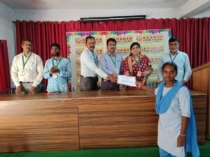 Student receiving banking and finance course certificate from Coursync during BFSI training at Adarsh College Visakhapatnam.