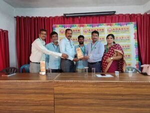 Student receiving BFSI Banking award certificate during course completion ceremony at Adarsh College Visakhapatnam.