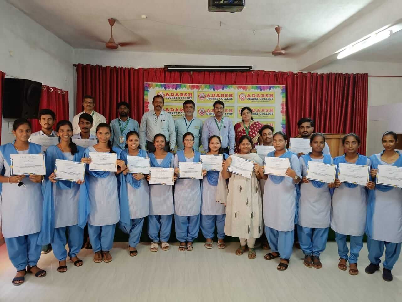 Students and faculty posing for a group photo after BFSI Banking course certificate distribution at Adarsh College Visakhapatnam.