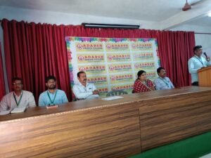 Speaker addressing students during the BFSI Banking course certificate ceremony at Adarsh College Visakhapatnam.