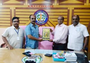 Instructor Venkateswarlu receiving an award during the Coursync BFSI Banking program at AMAL College, Anakapalle.