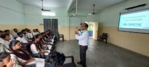 Instructor Venkateswarlu teaching Python to students during the Coursync BFSI Banking live training program at AMAL College, Anakapalle.