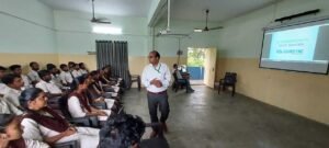 Instructor Venkateswarlu teaching Python to students during the Coursync BFSI Banking program at AMAL College, Anakapalle.
