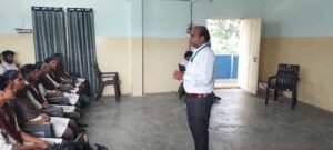 Instructor Venkateswarlu teaching Python to students during the Coursync BFSI Banking live training at AMAL College, Anakapalle.