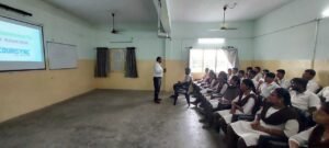 Instructor Venkateswarlu teaching Python to students during the Coursync BFSI Banking program at AMAL College, Anakapalle.