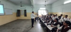 Instructor Venkateswarlu teaching Python to students during the Coursync BFSI Banking training program at AMAL College, Anakapalle.
